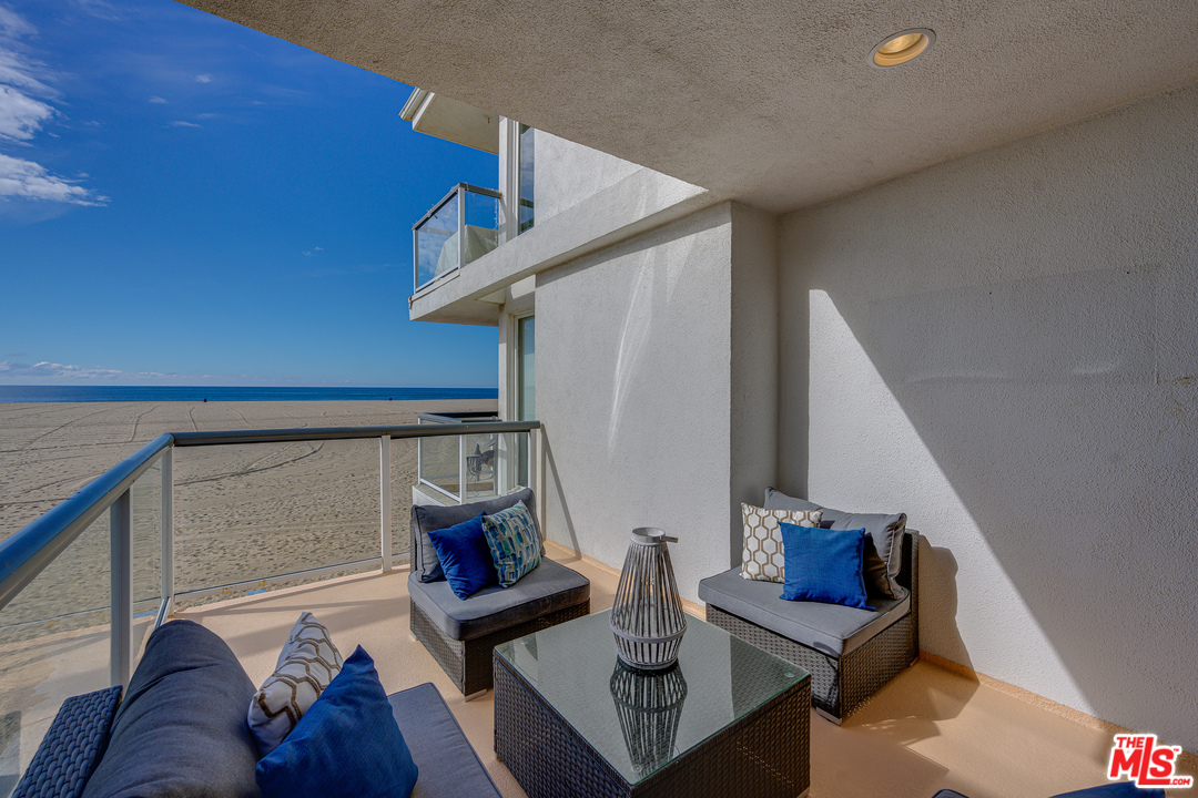 4 Quarterdeck Street, Unit 101 Marina del Rey, CA 90292 - Photo 18 of 29 a living room with furniture and stairs