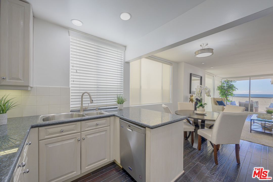 4 Quarterdeck Street, Unit 101 Marina del Rey, CA 90292 - Photo 21 of 29 a kitchen with sink and cabinets
