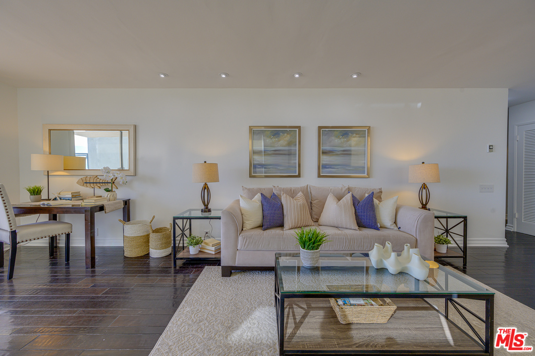 4 Quarterdeck Street, Unit 101 Marina del Rey, CA 90292 - Photo 28 of 29 a living room with furniture and wooden floor