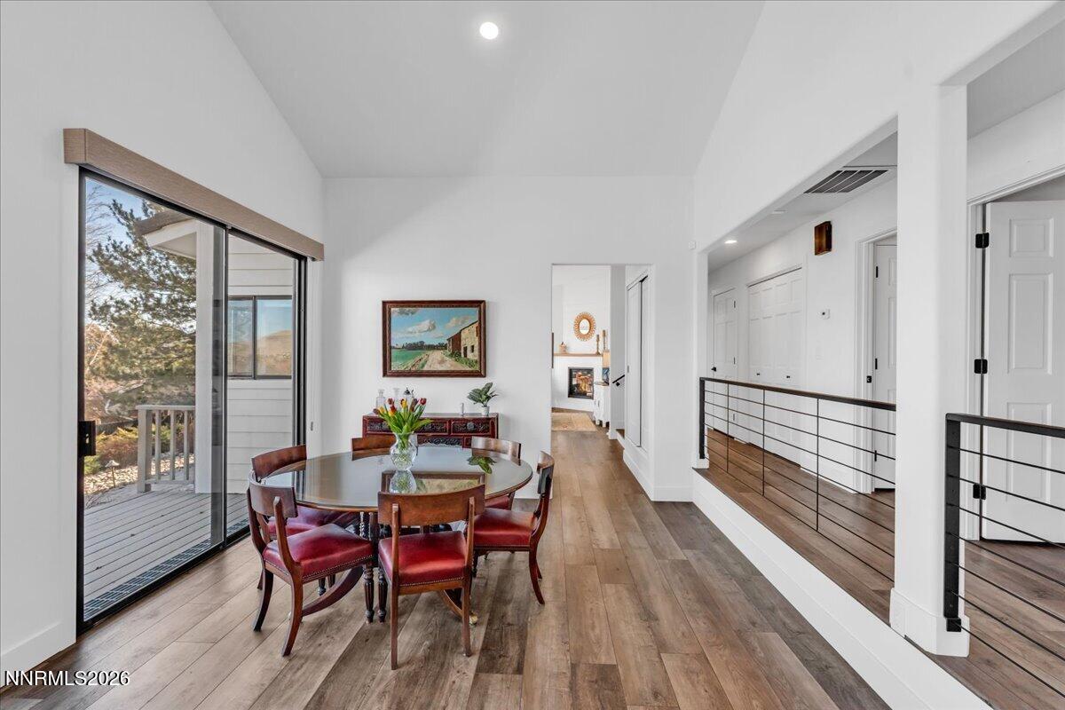 1243 Sharrow Way Carson City, NV 89703 - Photo 11 of 67 a view of a dining room with furniture window and wooden floor