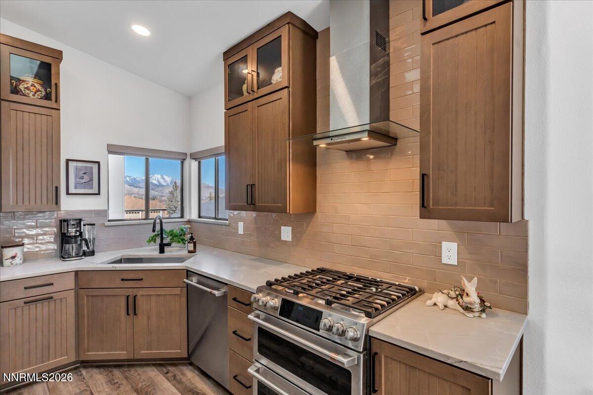 1243 Sharrow Way Carson City, NV 89703 - Photo 17 of 67 a kitchen with cabinets and appliances