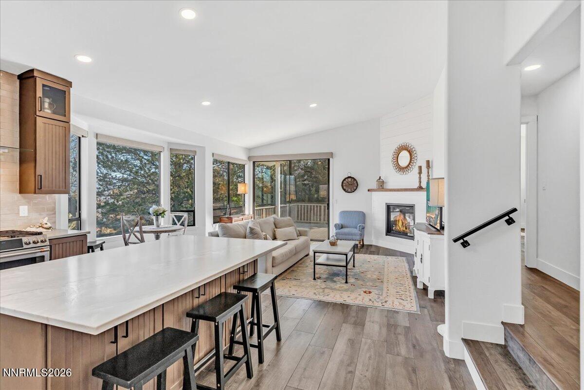 1243 Sharrow Way Carson City, NV 89703 - Photo 24 of 67 a large white kitchen with sink table and chairs