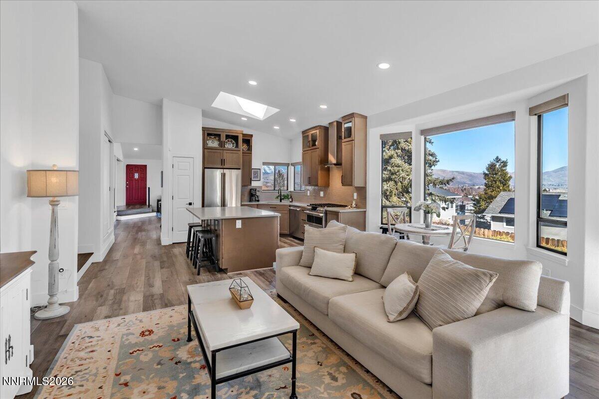 1243 Sharrow Way Carson City, NV 89703 - Photo 30 of 67 a living room with furniture and a flat screen tv