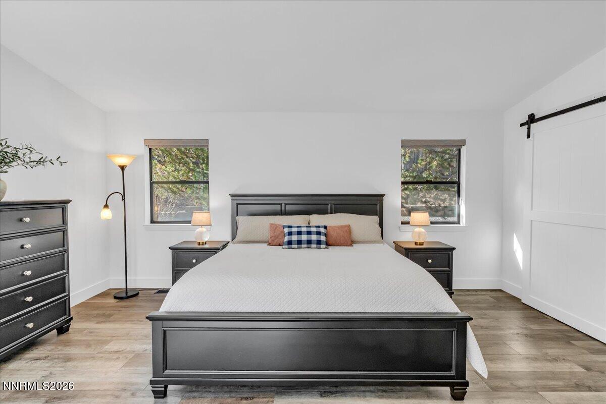 1243 Sharrow Way Carson City, NV 89703 - Photo 37 of 67 a bedroom with a bed and window
