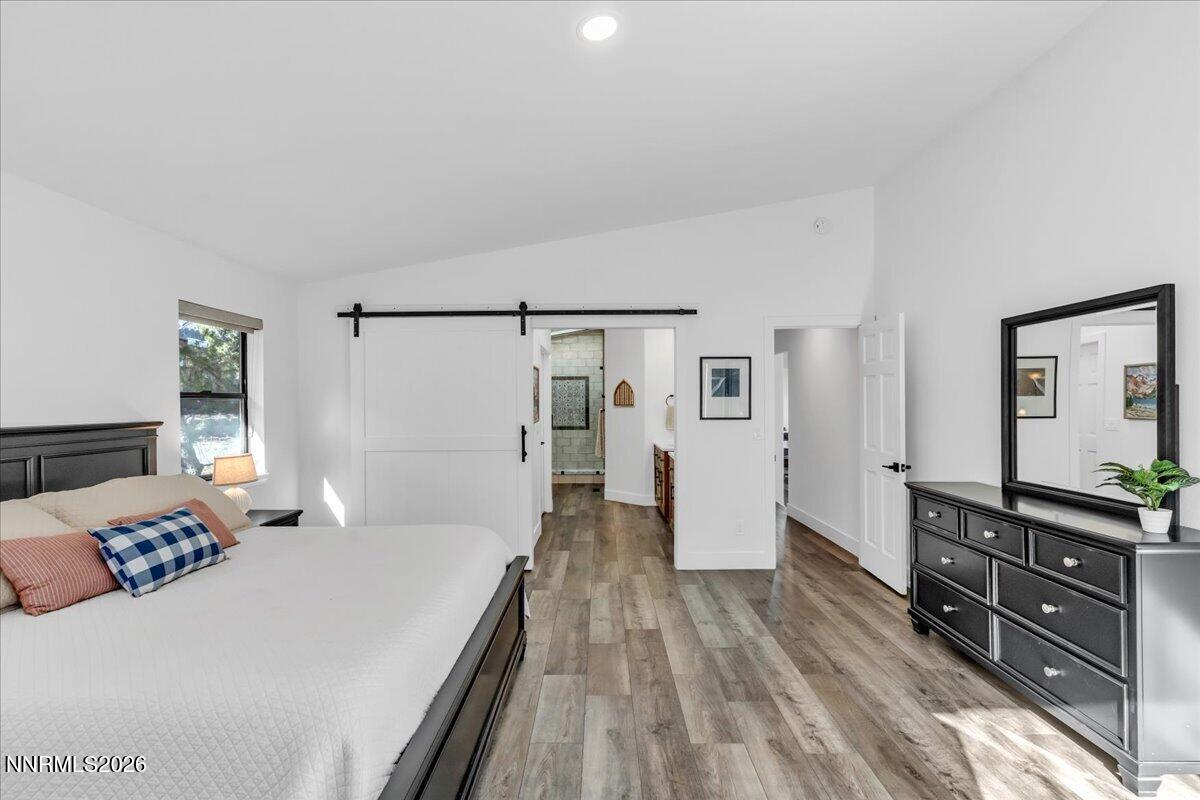 1243 Sharrow Way Carson City, NV 89703 - Photo 38 of 67 a bedroom with a bed and a dresser