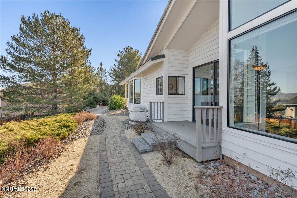 1243 Sharrow Way Carson City, NV 89703 - Photo 4 of 67 a view of a house with backyard and sitting area