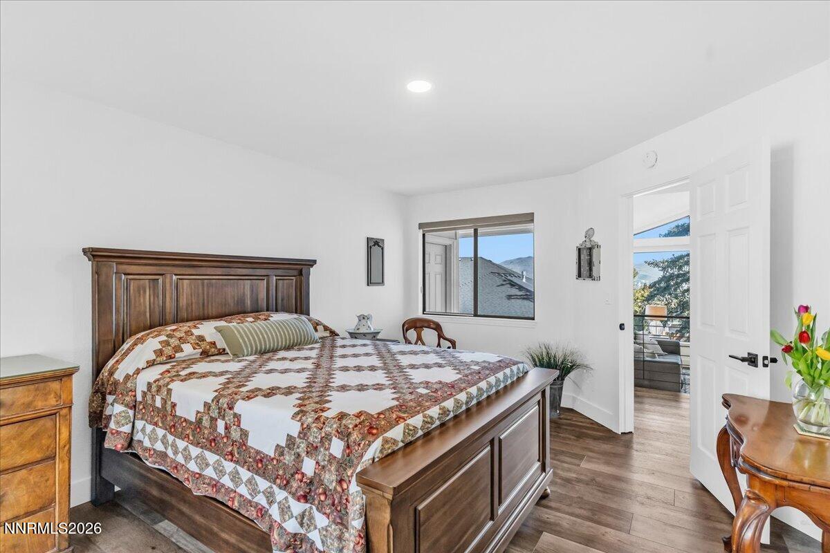 1243 Sharrow Way Carson City, NV 89703 - Photo 43 of 67 a bedroom with a bed and a table in it