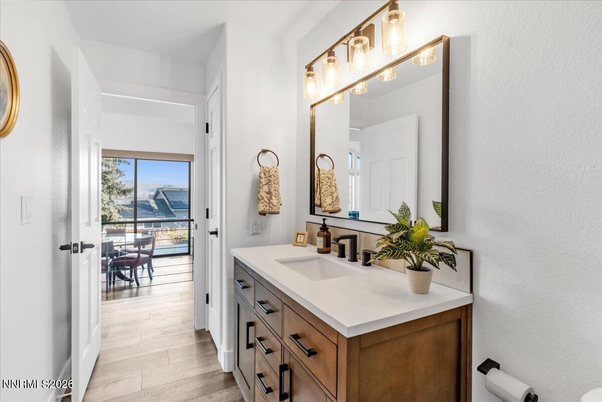 1243 Sharrow Way Carson City, NV 89703 - Photo 46 of 67 a bathroom with a sink and a mirror