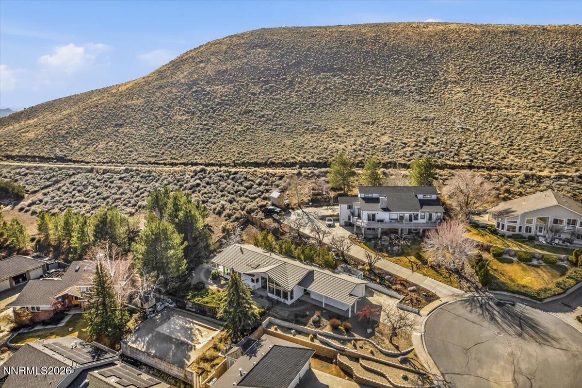 1243 Sharrow Way Carson City, NV 89703 - Photo 62 of 67 an aerial view of residential houses with outdoor space