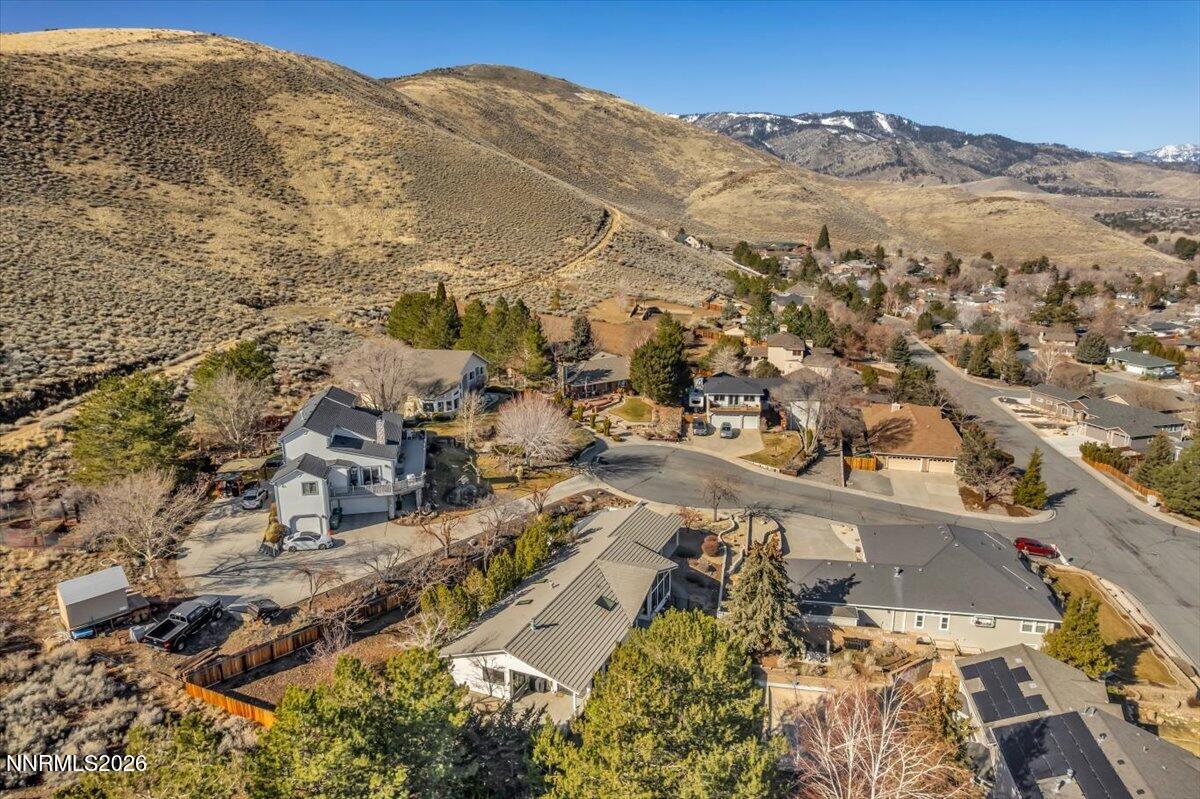 1243 Sharrow Way Carson City, NV 89703 - Photo 65 of 67 an aerial view of residential houses with outdoor space