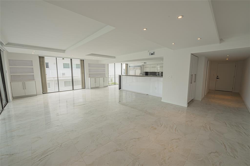 468 Golden Isles Drive, Unit 402 Hallandale Beach, FL 33009 - Photo 14 of 53 a view of an empty room with a window