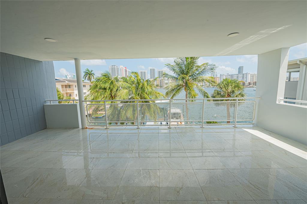 468 Golden Isles Drive, Unit 402 Hallandale Beach, FL 33009 - Photo 18 of 53 a view of an empty room with a window