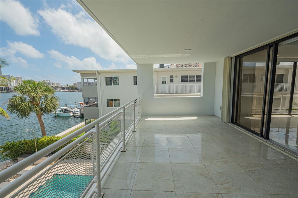 468 Golden Isles Drive, Unit 402 Hallandale Beach, FL 33009 - Photo 2 of 53 a view of balcony and deck