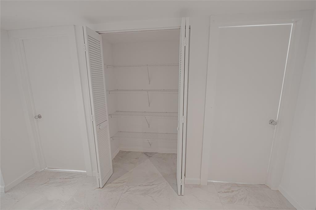 468 Golden Isles Drive, Unit 402 Hallandale Beach, FL 33009 - Photo 33 of 53 a view of an empty room