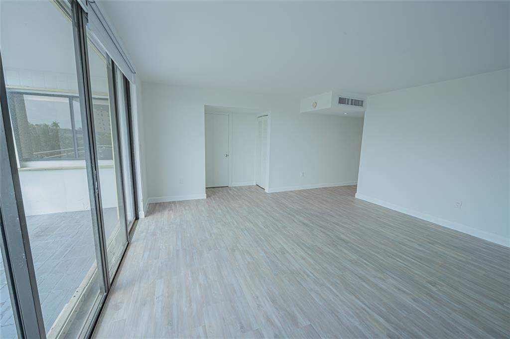 468 Golden Isles Drive, Unit 402 Hallandale Beach, FL 33009 - Photo 40 of 53 wooden floor in an empty room