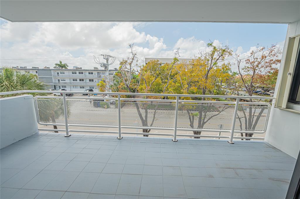 468 Golden Isles Drive, Unit 402 Hallandale Beach, FL 33009 - Photo 41 of 53 a view of a terrace