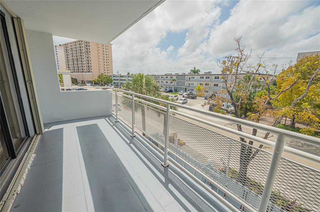 468 Golden Isles Drive, Unit 402 Hallandale Beach, FL 33009 - Photo 43 of 53 a view of balcony with city view