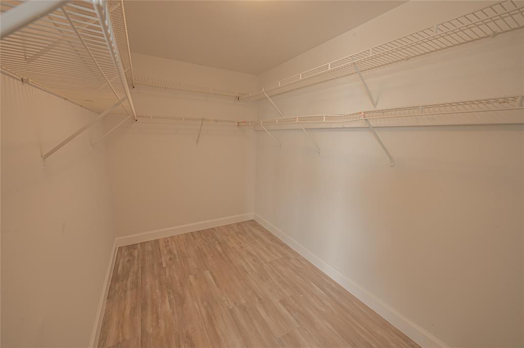 468 Golden Isles Drive, Unit 402 Hallandale Beach, FL 33009 - Photo 45 of 53 a view of a room with wooden floor