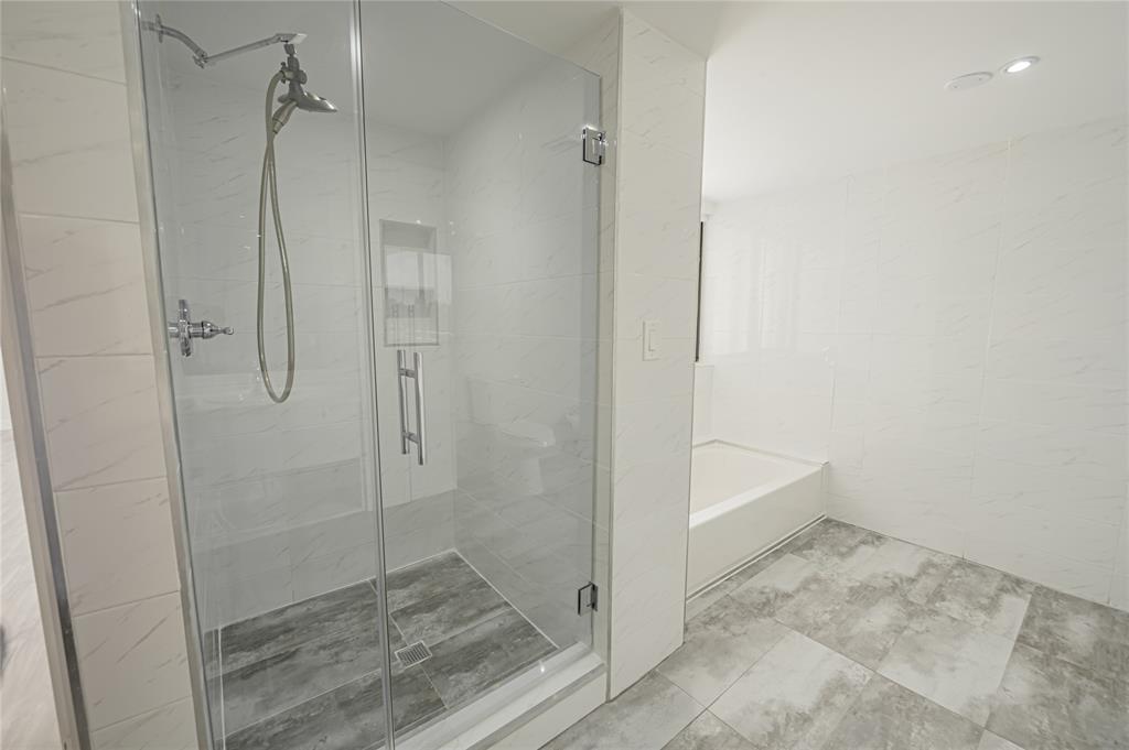 468 Golden Isles Drive, Unit 402 Hallandale Beach, FL 33009 - Photo 49 of 53 a bathroom with a shower
