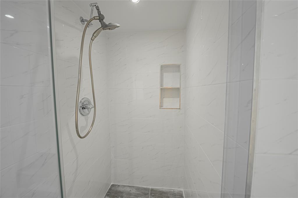 468 Golden Isles Drive, Unit 402 Hallandale Beach, FL 33009 - Photo 50 of 53 a bathroom with a shower
