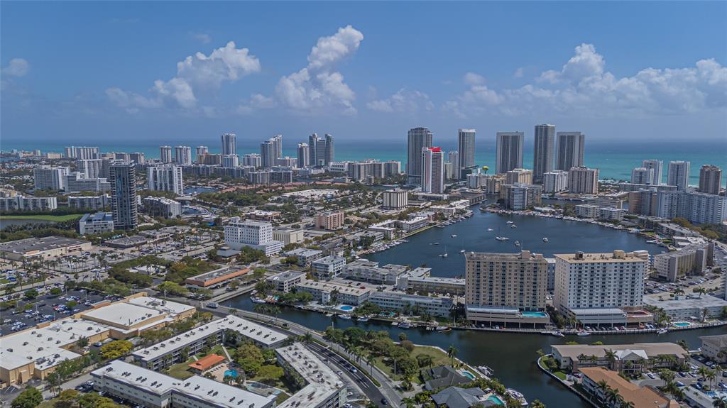 468 Golden Isles Drive, Unit 402 Hallandale Beach, FL 33009 - Photo 5 of 53 a city view with lot of high rise buildings