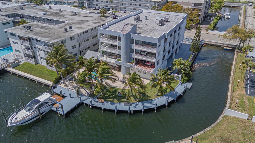 468 Golden Isles Drive, Unit 402 Hallandale Beach, FL 33009 - Photo 6 of 53 a aerial view of a house with a garden space