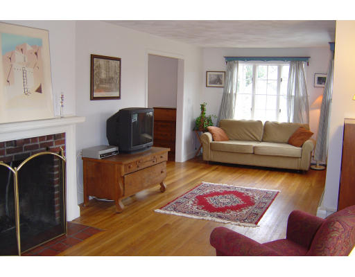 28 Richard Road Lexington, MA 02421 - Photo 3 of 5 a living room with furniture and a window