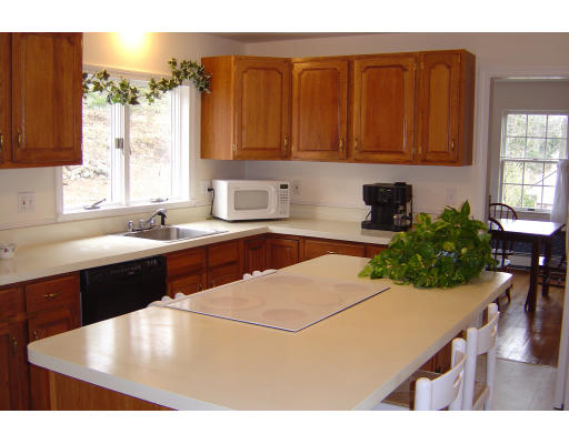 28 Richard Road Lexington, MA 02421 - Photo 4 of 5 a kitchen with a sink cabinets and window
