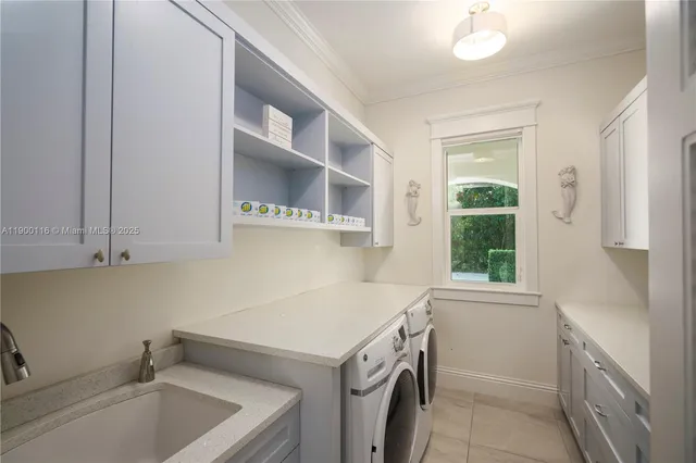 a bathroom with a sink and shower