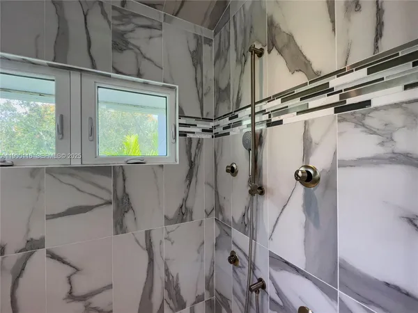 a view of swimming pool with outdoor seating