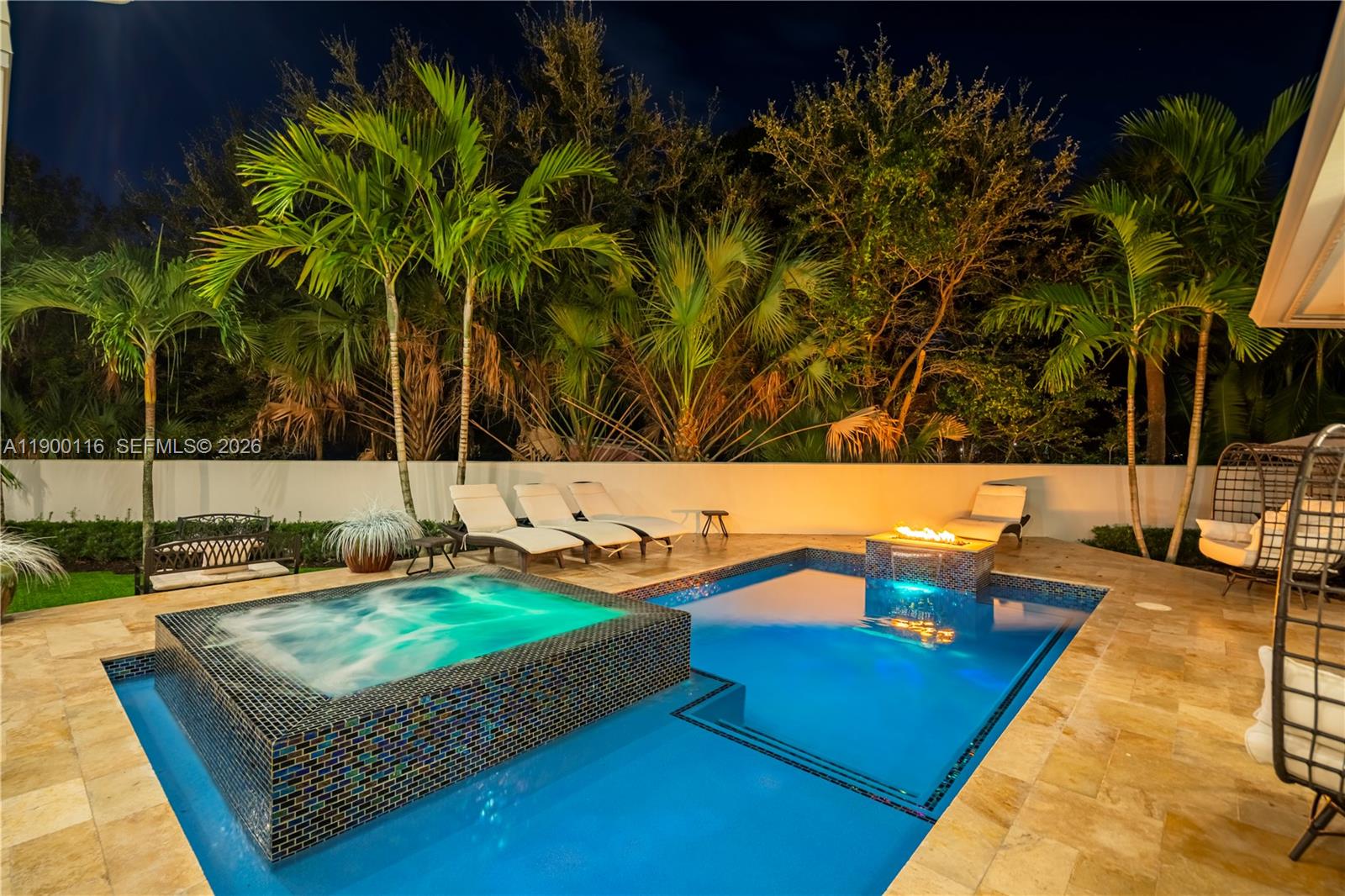 545 Southwest Indianola Street Stuart, FL 34994 - Photo 50 of 64 a view of a swimming pool with a lounge chair