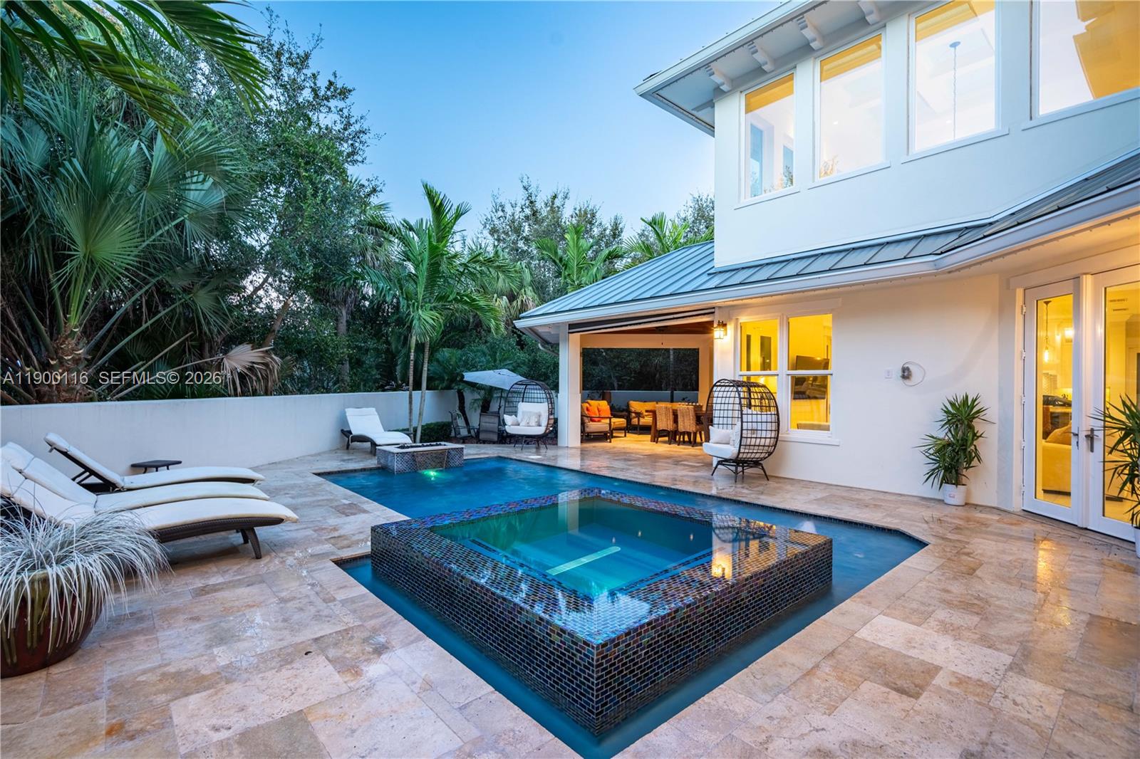 545 Southwest Indianola Street Stuart, FL 34994 - Photo 53 of 64 swimming pool view with a seating space