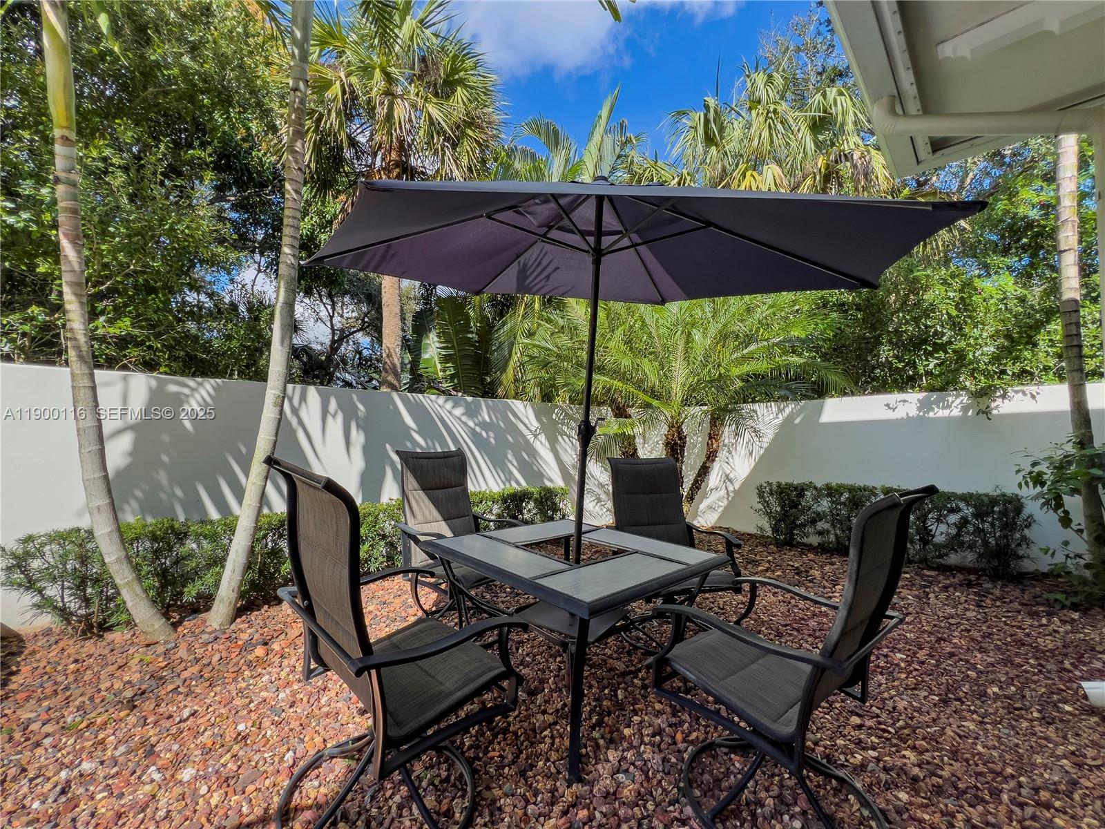 545 Southwest Indianola Street Stuart, FL 34994 - Photo 55 of 64 a view of an outdoor sitting area with furniture