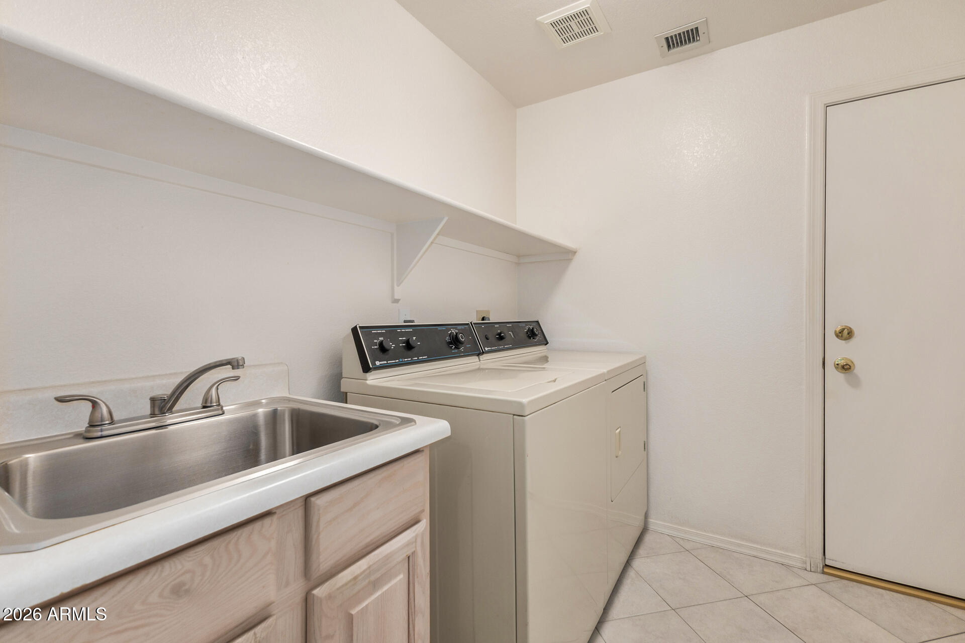 6558 East Roland Street Mesa, AZ 85215 - Photo 34 of 38 Laundry Room