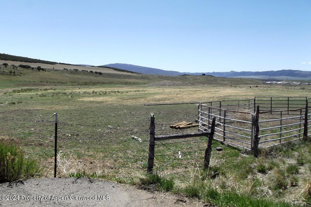 15 County Road 15 Meeker, CO 81641 - Photo 3 of 9 a view of a lake with a yard
