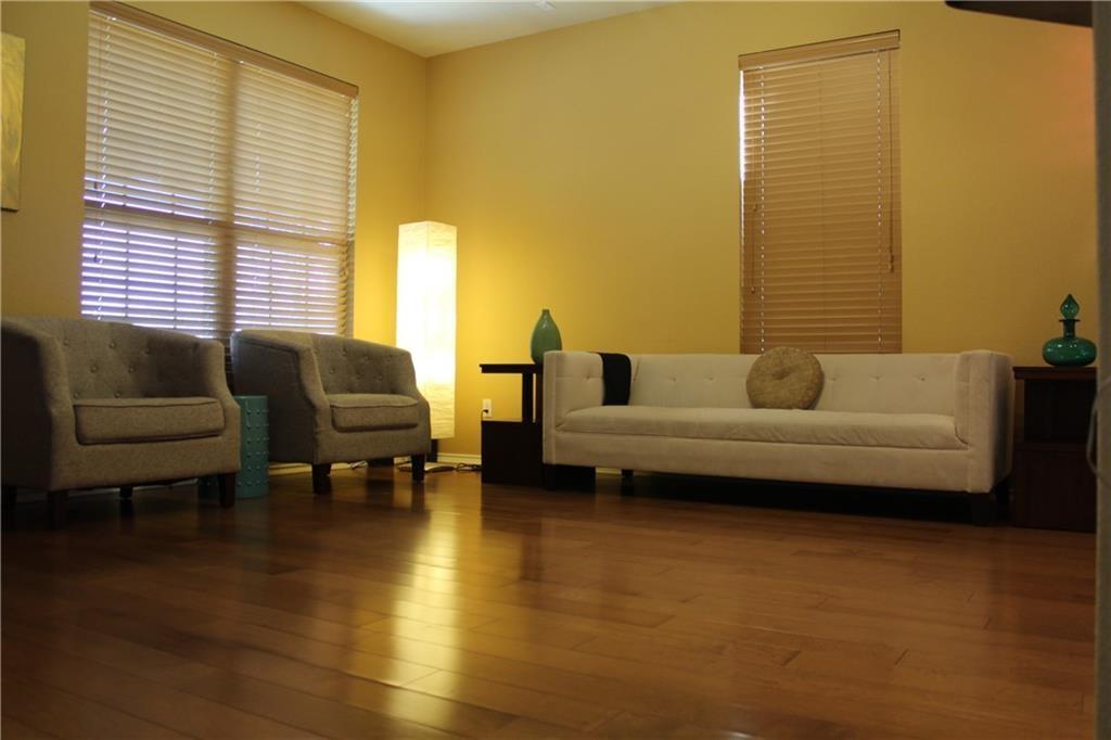 1310 West Parmer Lane, Unit 1503 Austin, TX 78727 - Photo 12 of 26 Sitting room with hardwood / wood-style floors