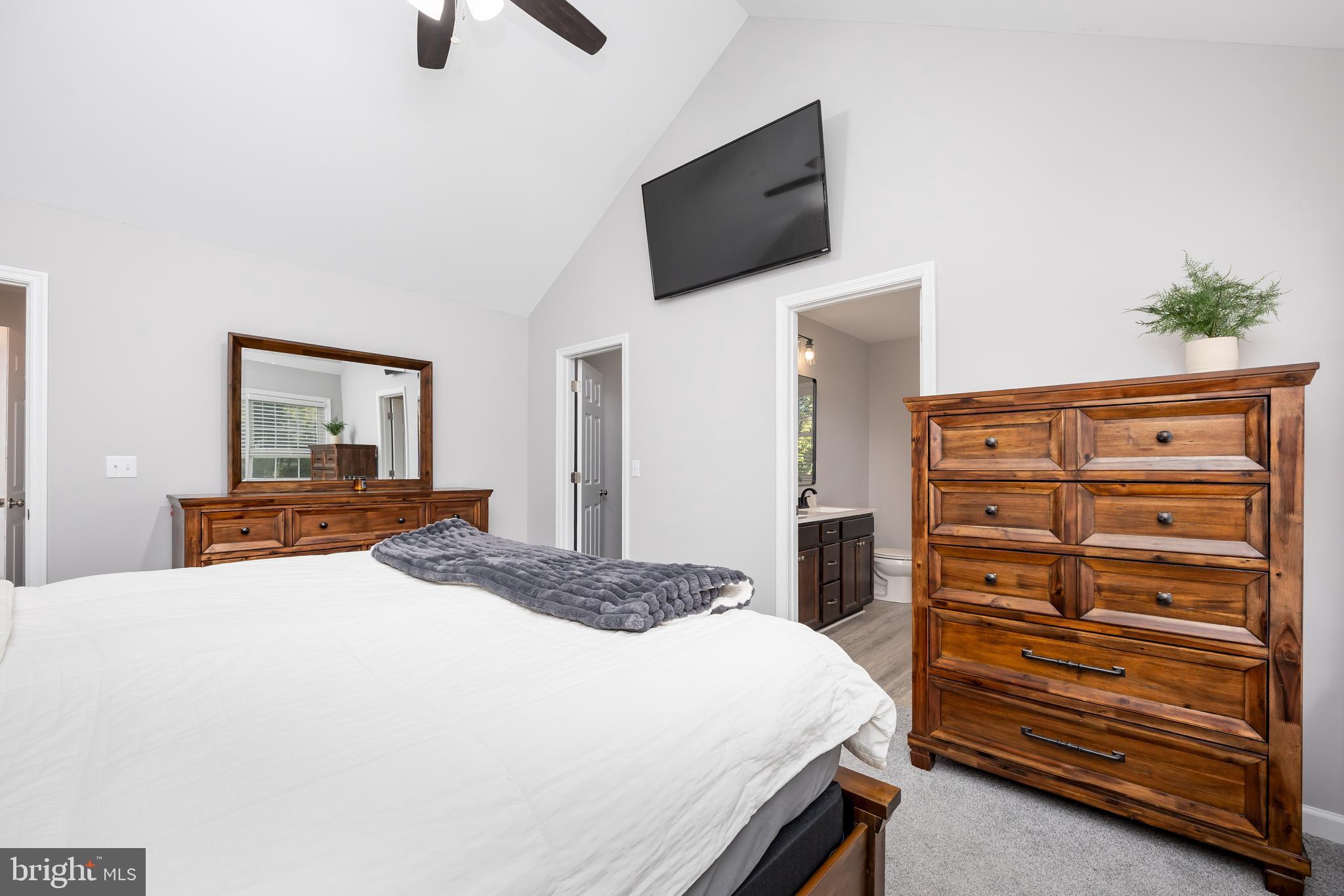 211 Moonglow Road Fruitland, MD 21826 - Photo 23 of 67 a bedroom with a bed and a television