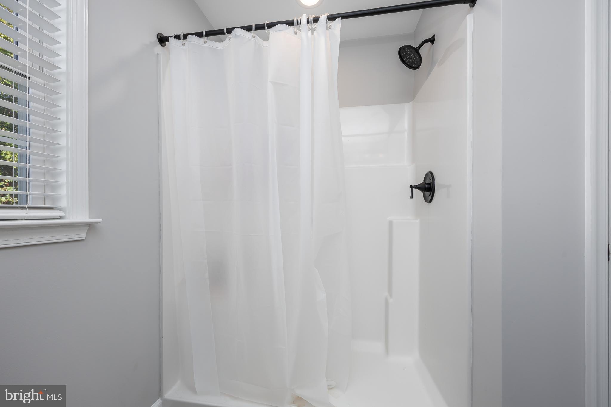 211 Moonglow Road Fruitland, MD 21826 - Photo 28 of 67 a bathroom with a shower