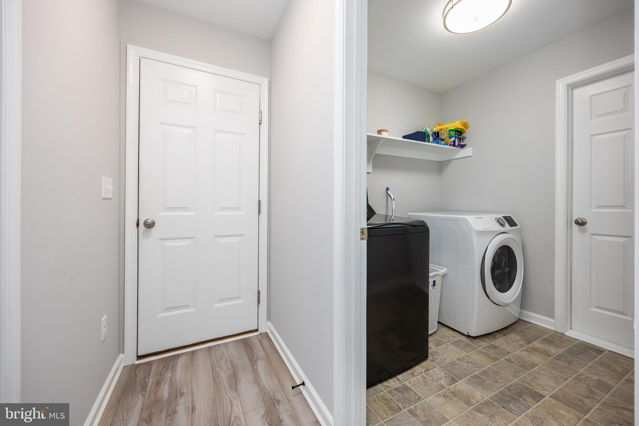 211 Moonglow Road Fruitland, MD 21826 - Photo 30 of 67 a utility room with dryer and washer