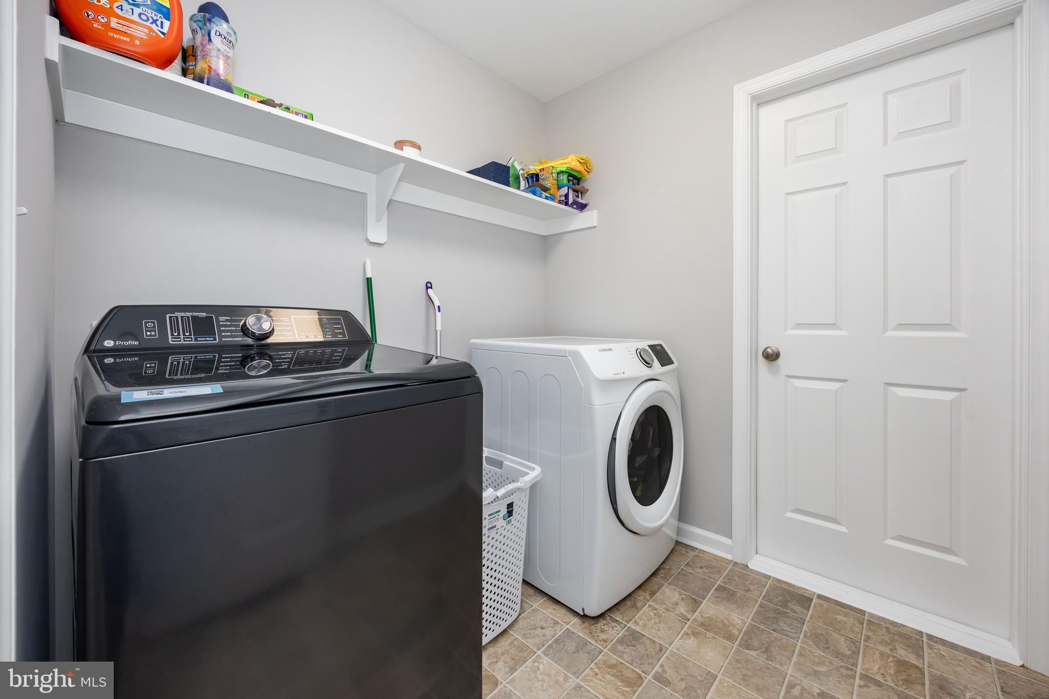 211 Moonglow Road Fruitland, MD 21826 - Photo 31 of 67 a utility room with dryer and washer