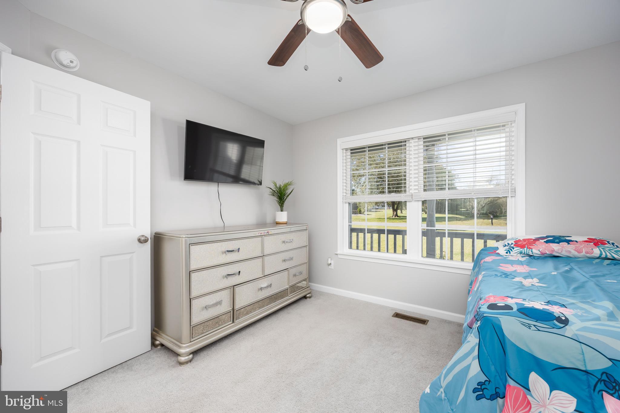 211 Moonglow Road Fruitland, MD 21826 - Photo 33 of 67 a bedroom with furniture and a window