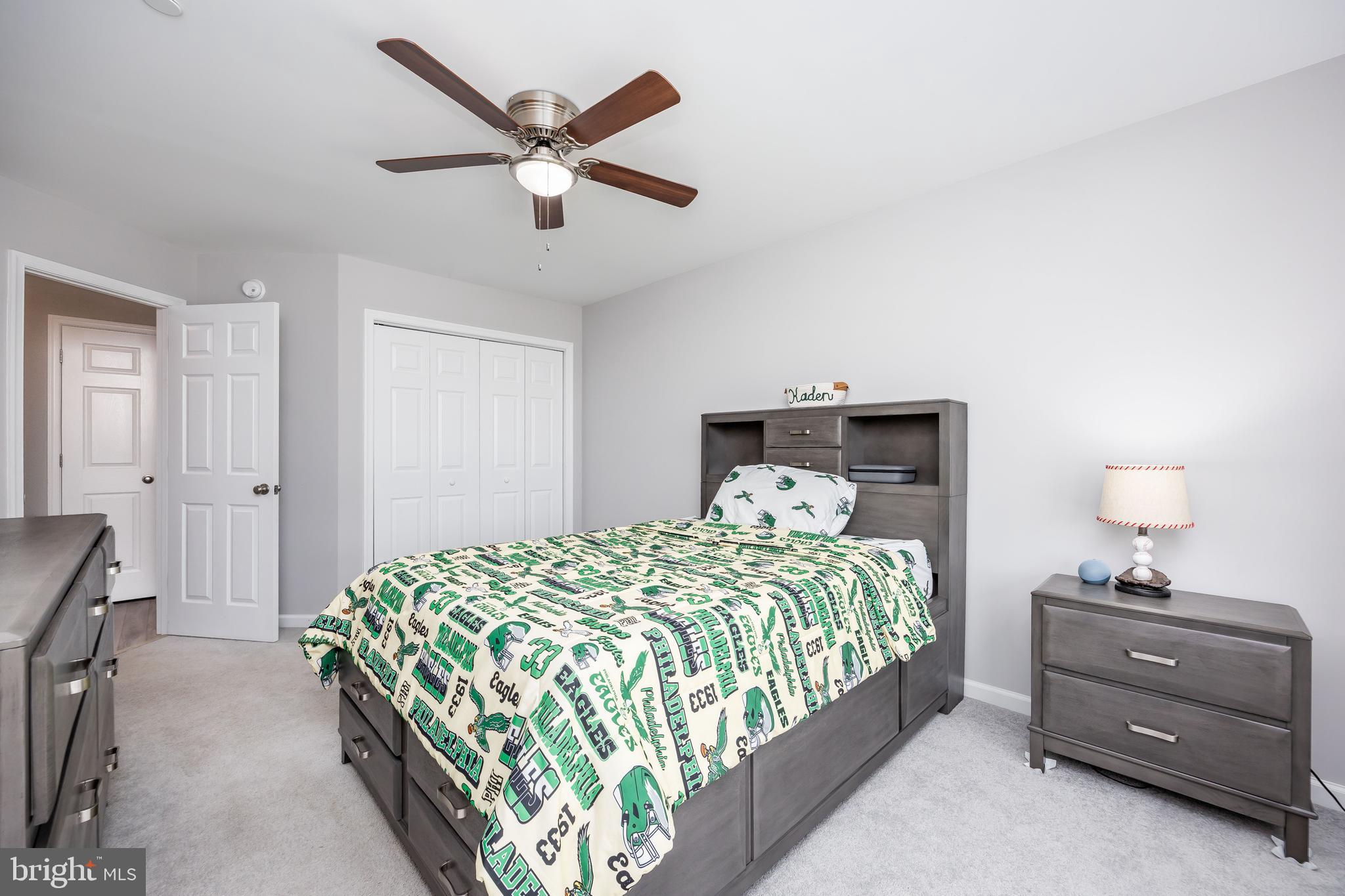211 Moonglow Road Fruitland, MD 21826 - Photo 38 of 67 a bedroom with a bed and a dresser