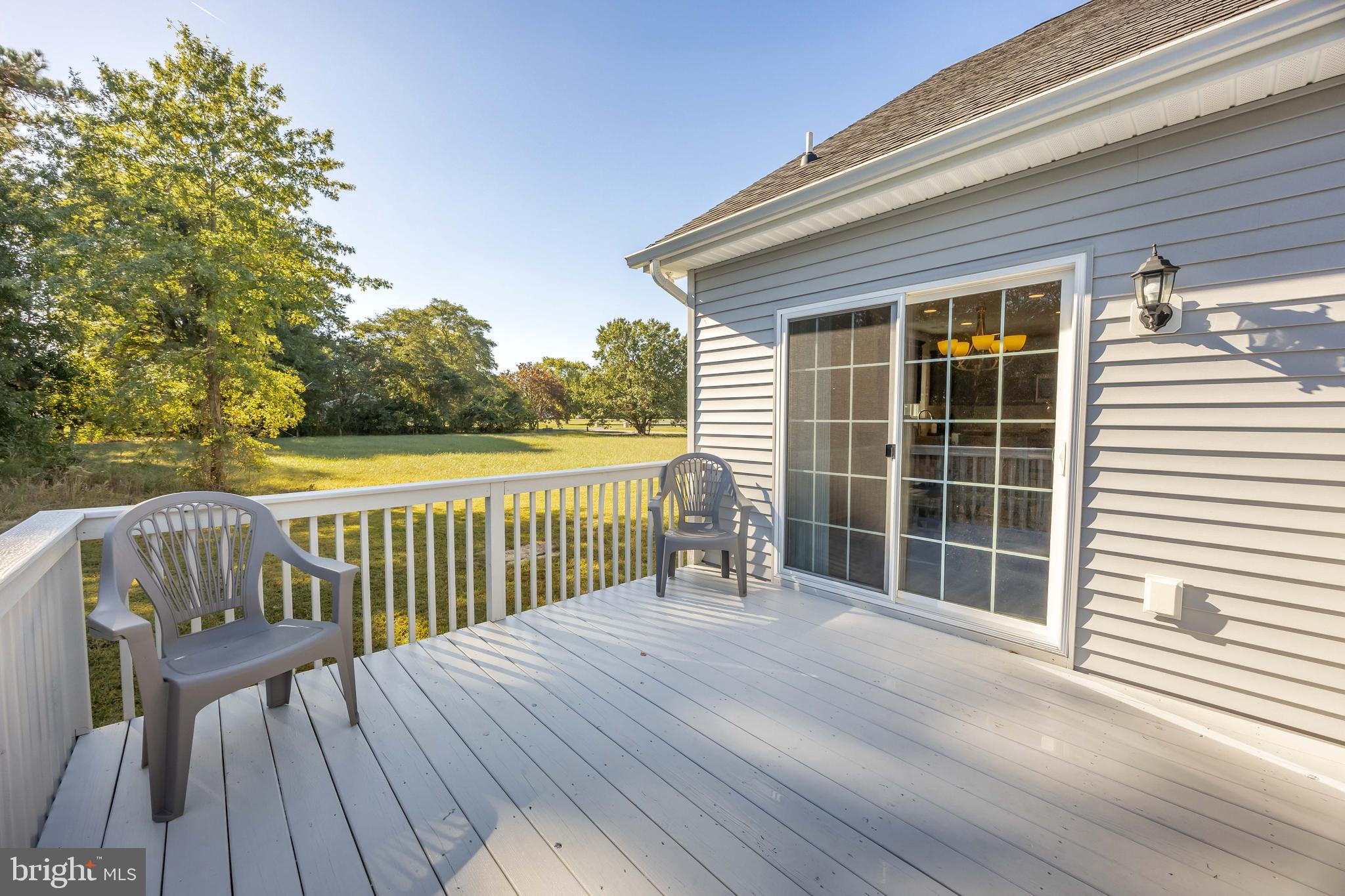 211 Moonglow Road Fruitland, MD 21826 - Photo 60 of 67 a view of deck with wooden floor and fence next to a yard