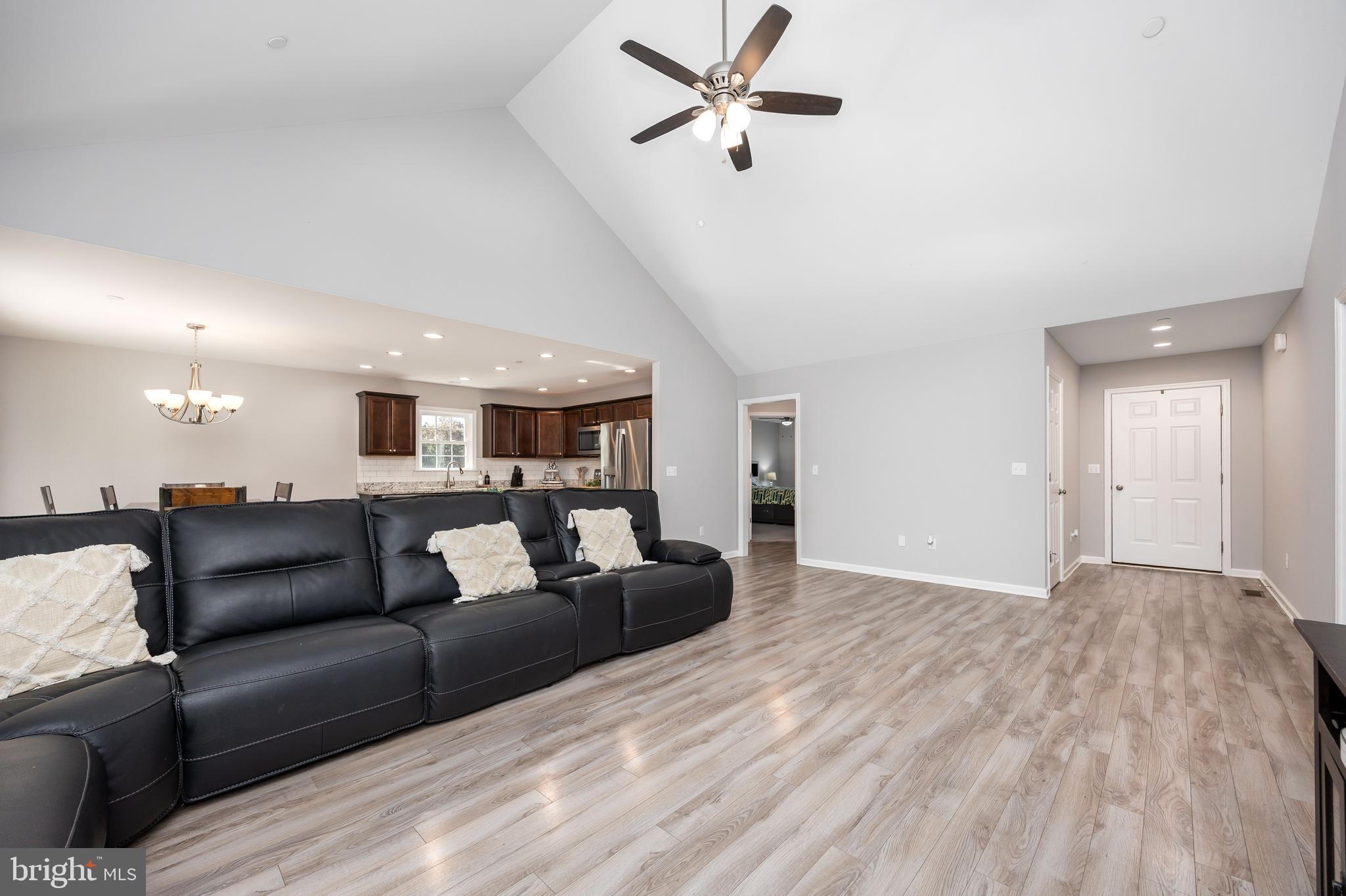 211 Moonglow Road Fruitland, MD 21826 - Photo 8 of 67 a view of a livingroom with furniture and a ceiling fan