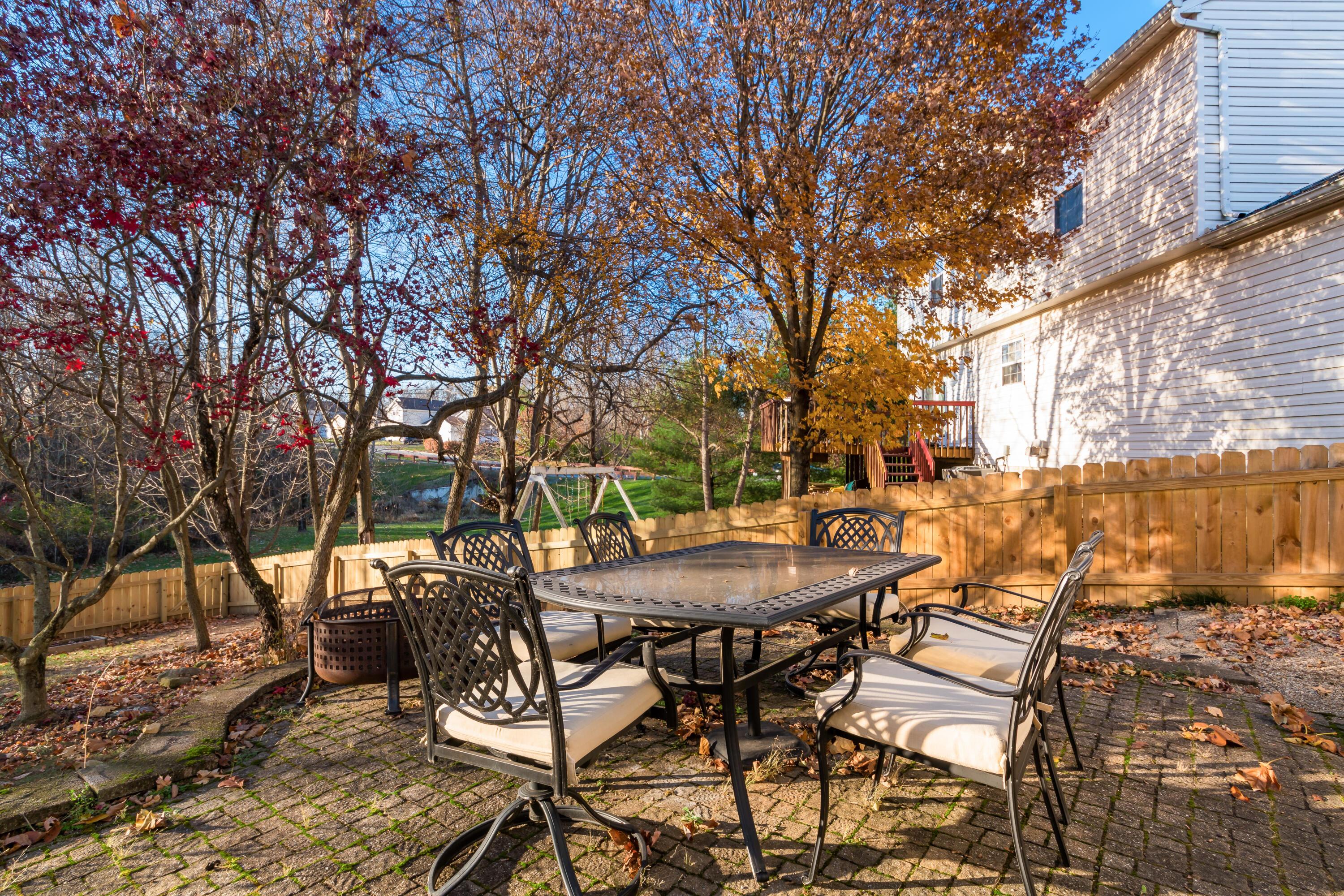565 Marcum Road Blacklick, OH 43004 - Photo 26 of 29 Hugh paver patio overlooking fenced backyard