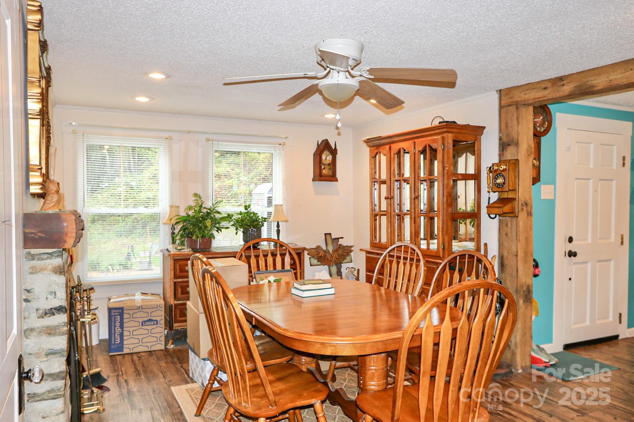 11979 Sparta Road McGrady, NC 28649 - Photo 18 of 48 a view of a dining room with furniture window and wooden floor