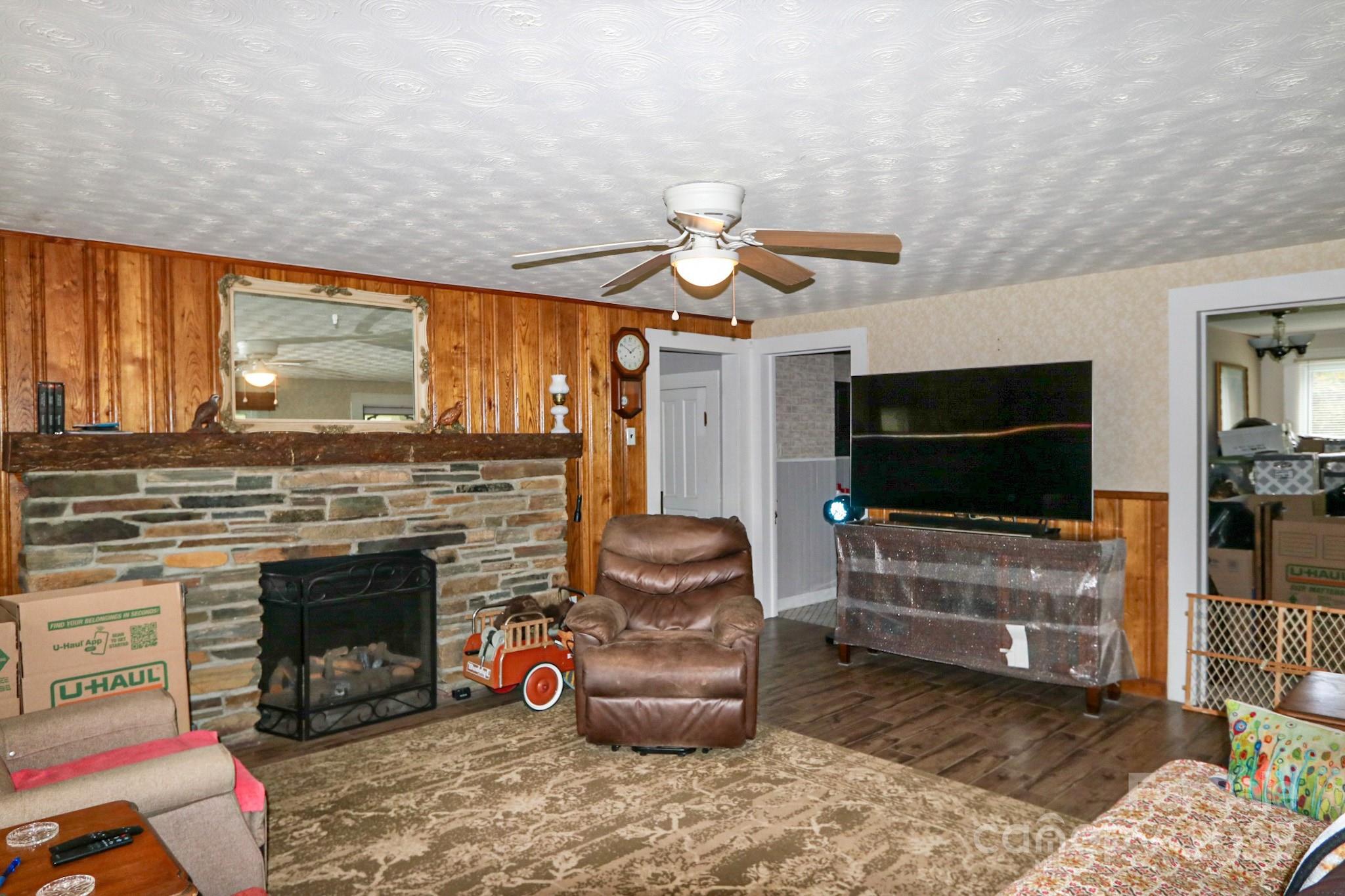 11979 Sparta Road McGrady, NC 28649 - Photo 19 of 48 a living room with furniture and a flat screen tv