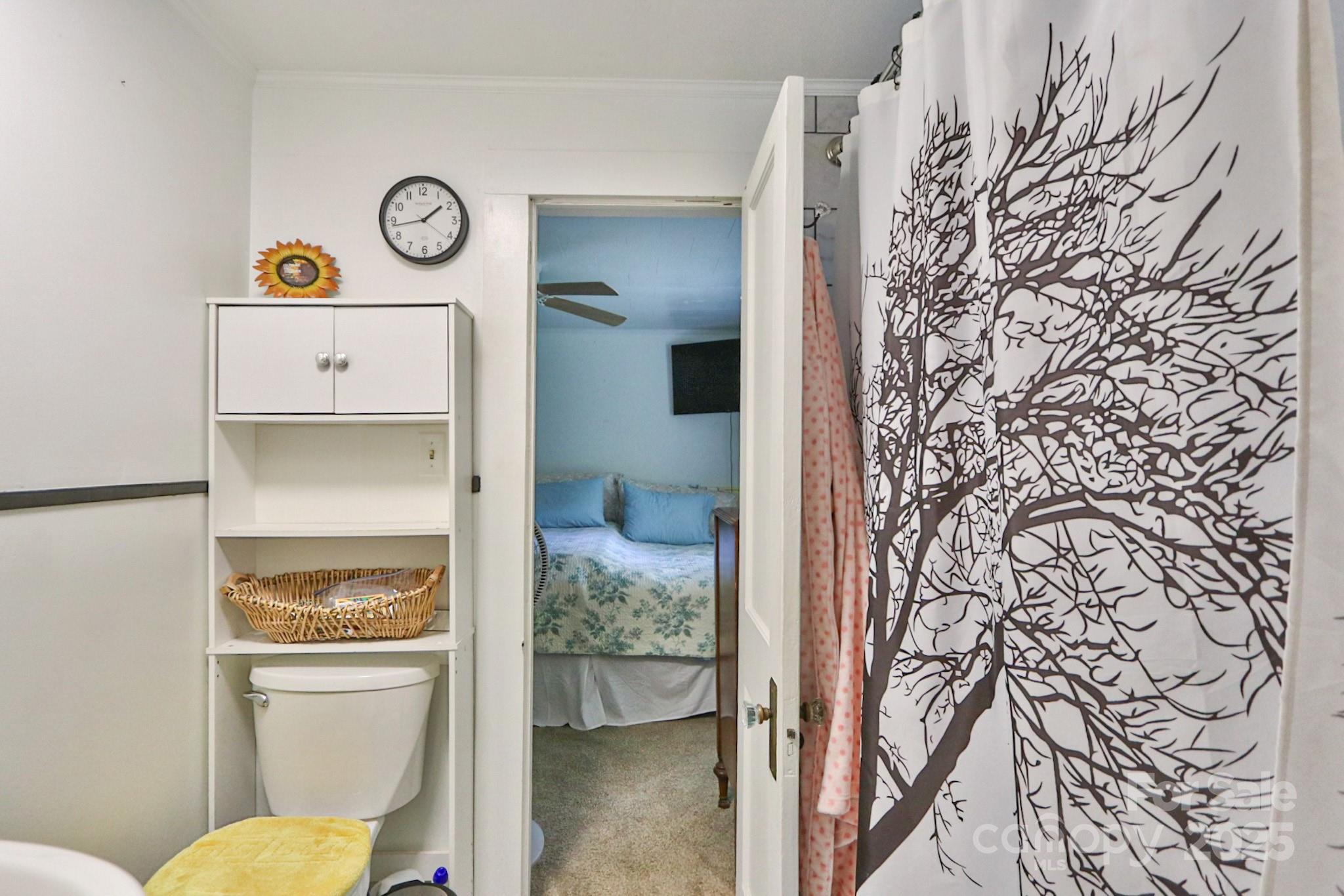 11979 Sparta Road McGrady, NC 28649 - Photo 24 of 48 a bathroom with a toilet and a shower