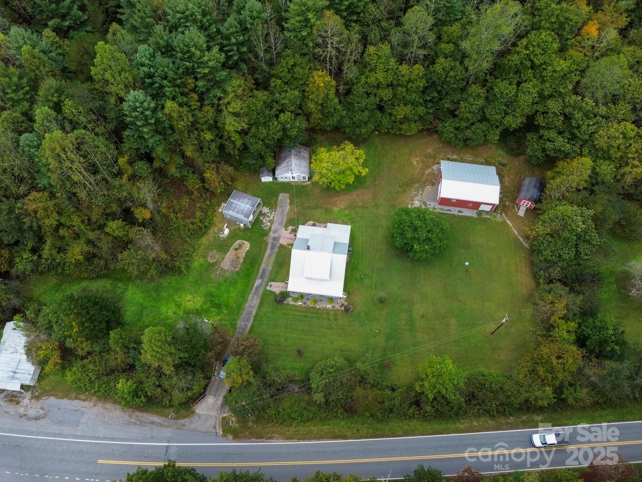 11979 Sparta Road McGrady, NC 28649 - Photo 3 of 48 an aerial view of a house