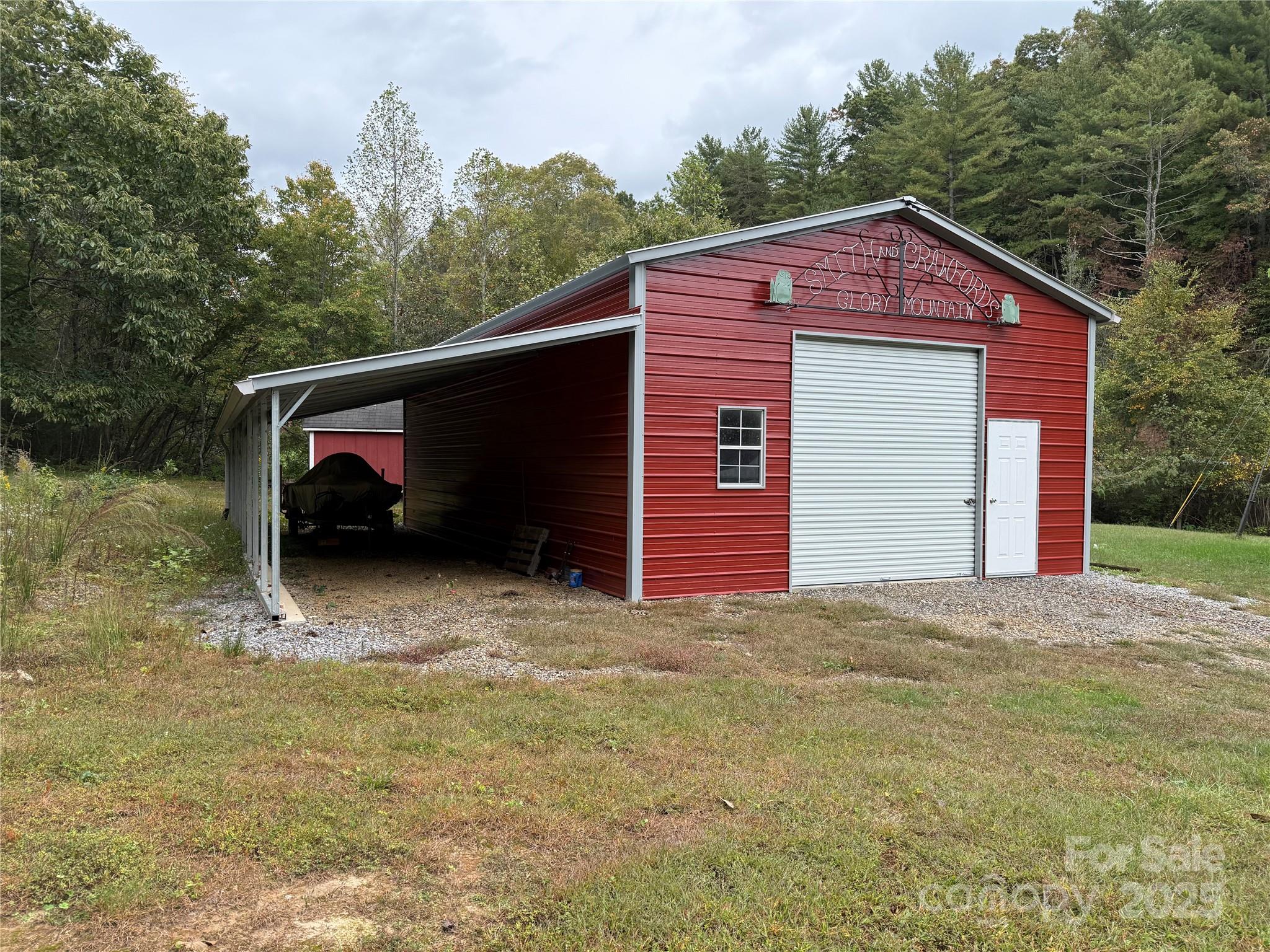 11979 Sparta Road McGrady, NC 28649 - Photo 36 of 48 a view of a house with a yard